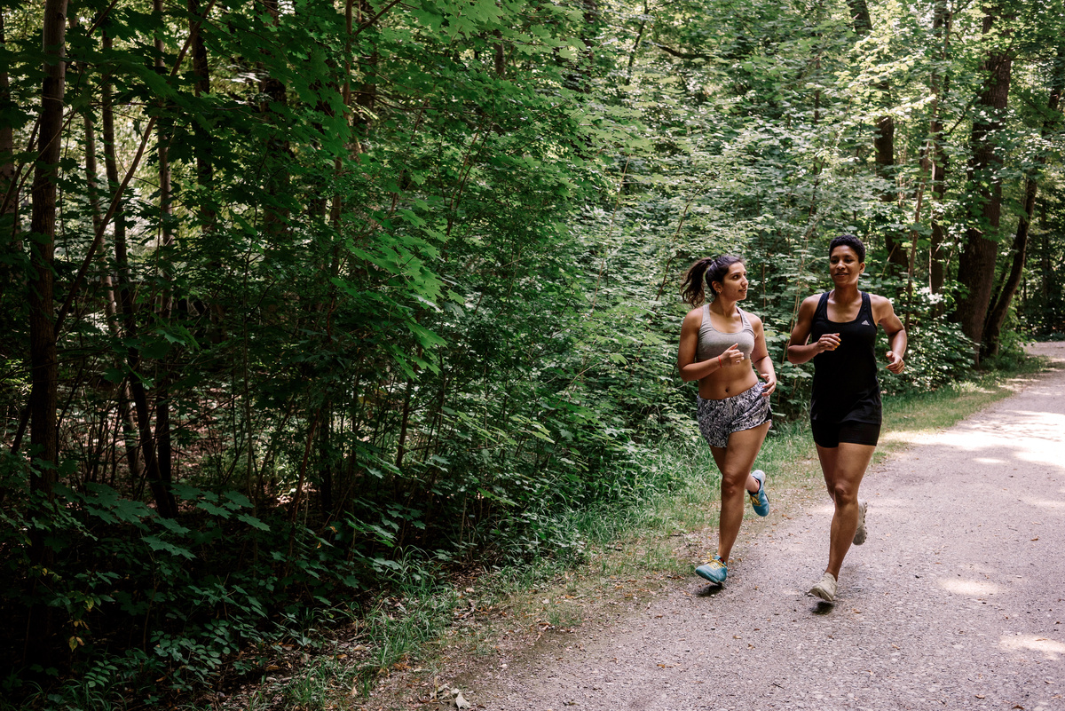 Women Jogging on Trail